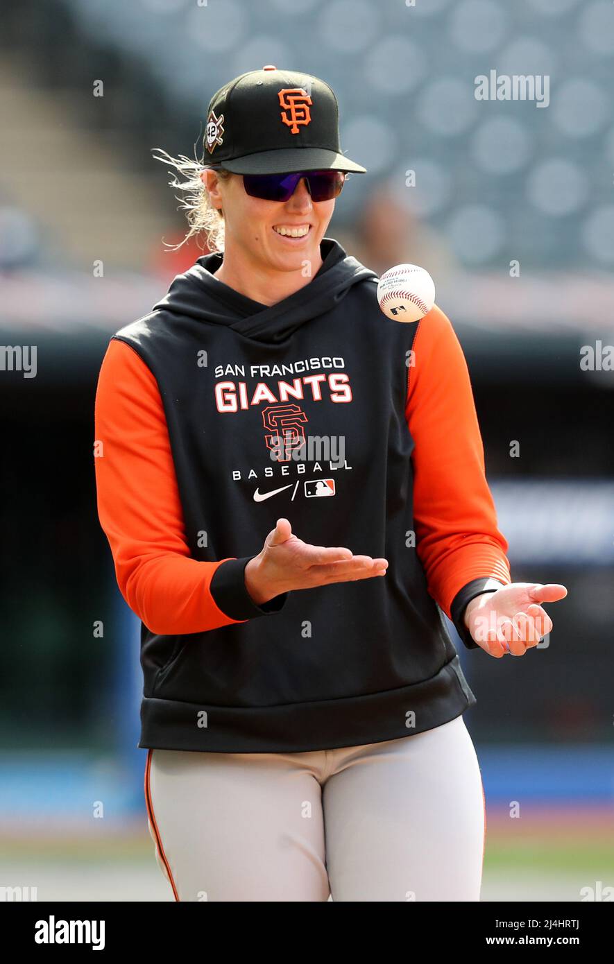 Cleveland, United States. 15th Apr, 2022. San Francisco Giants assistant coach Alyssa Nakken tosses the ball around prior to the Giants game against the Cleveland Guardians at Progressive Field in Cleveland, Ohio on Friday, April 15, 2022. Photo by Aaron Josefczyk/UPI Credit: UPI/Alamy Live News Stock Photo
