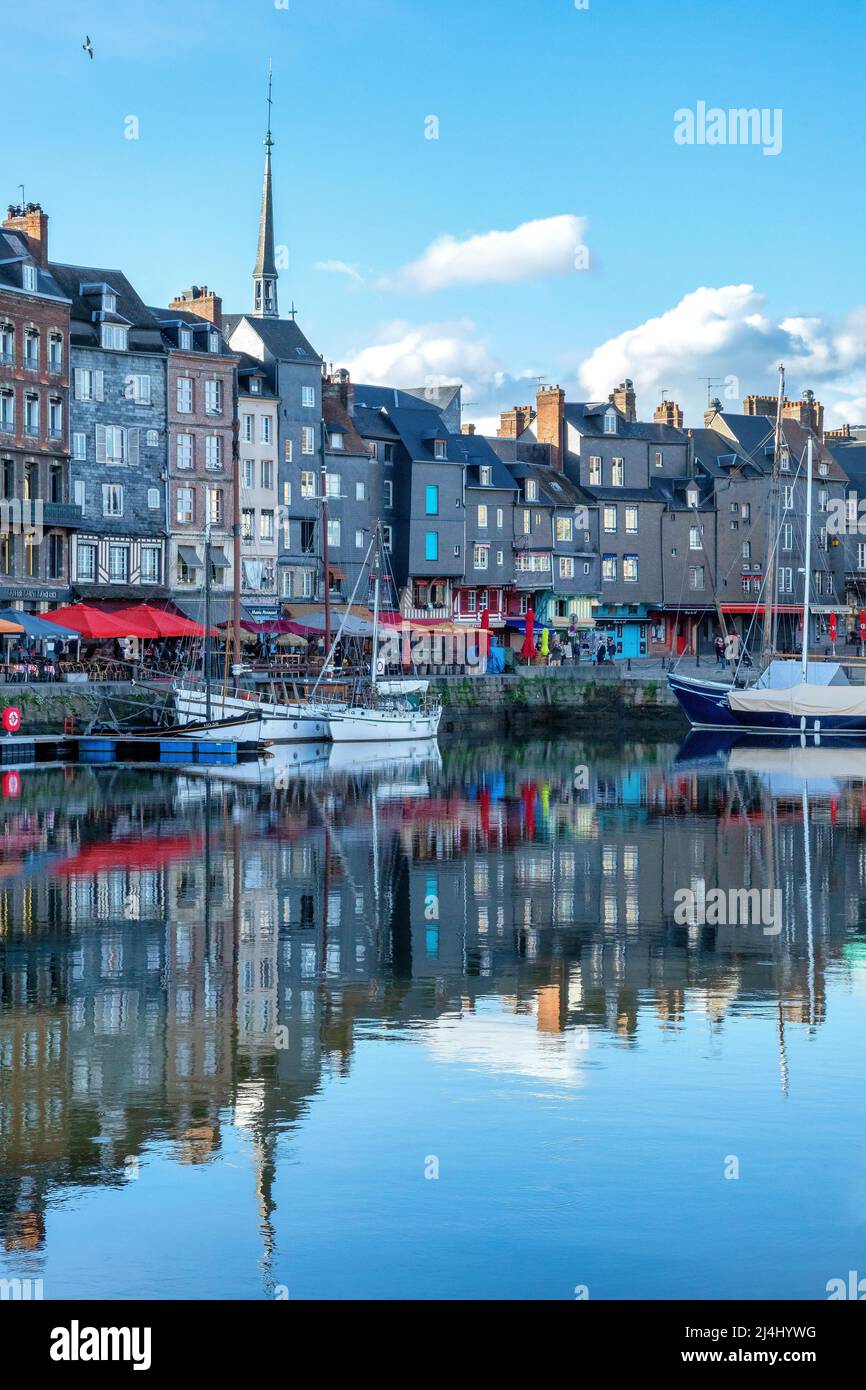 Reflections of the Honfleur harbor in Normandy, France Stock Photo