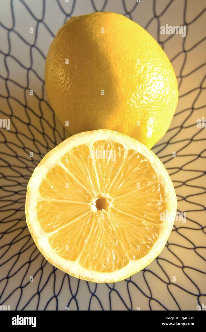 Sliced lemon on plate Stock Photo