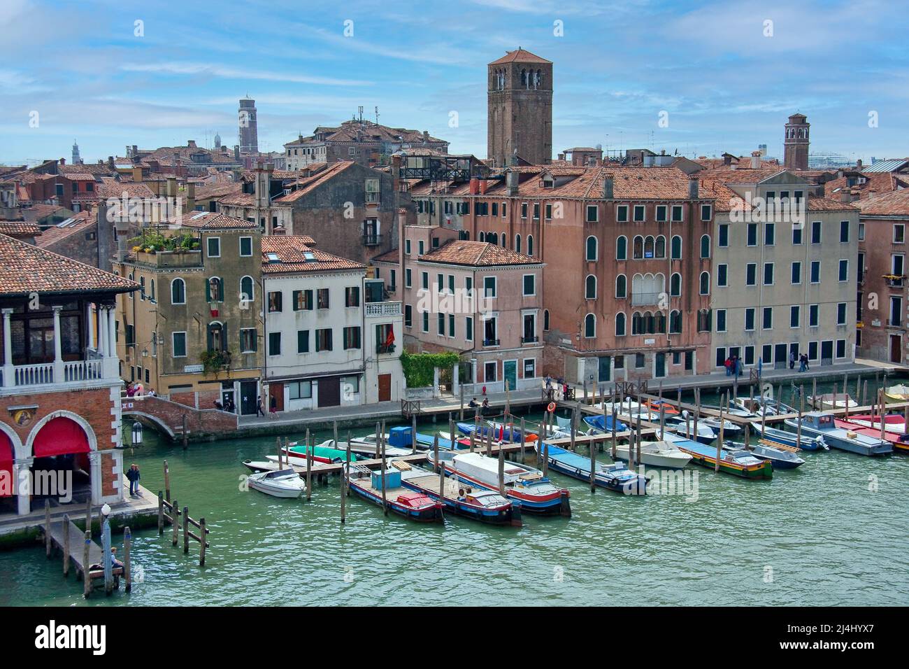 Small Boats docked on the Canal Grande in Venice, Italy Stock Photo