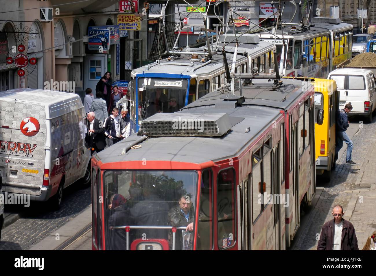 Tram, traffic and people on city street, Lviv, Ukraine Stock Photo