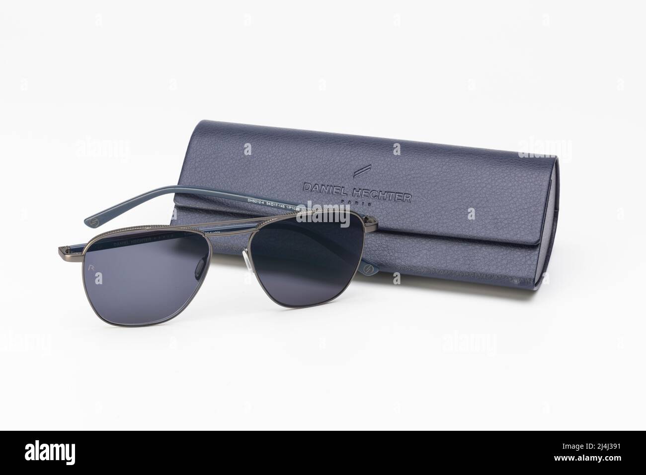 A pair of sunglasses with a blue Daniel Hechter case Stock Photo - Alamy