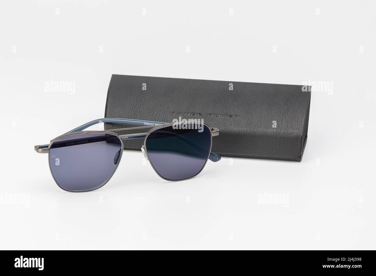 A pair of sunglasses with a Range Rover spectacle case Stock Photo
