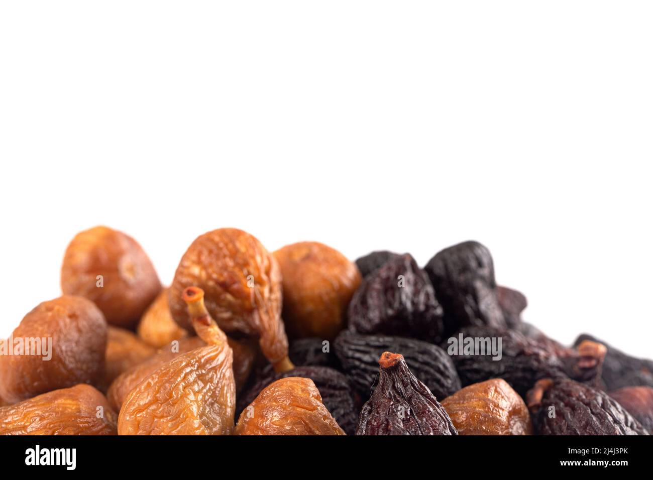 Two Varieties of Dried Figs Isolated on a White Background Stock Photo