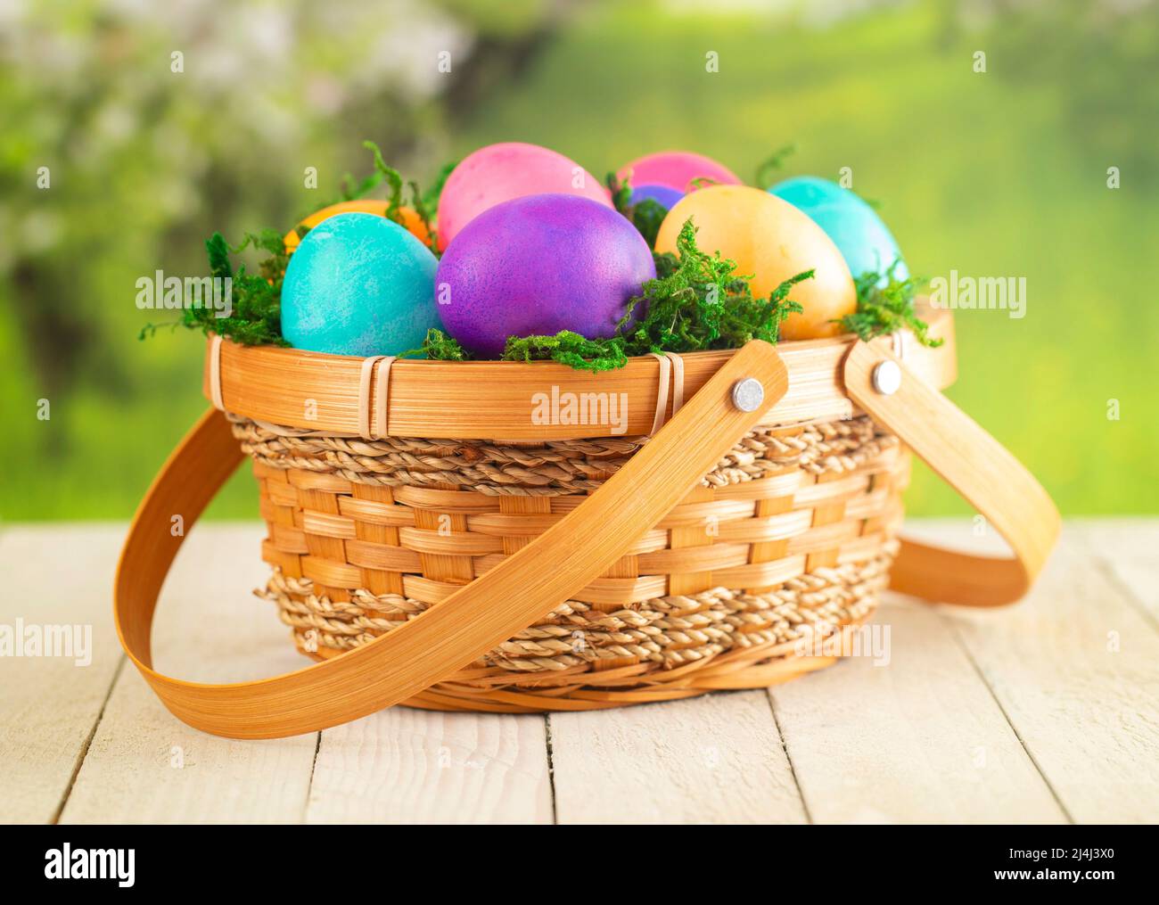 Basket Full of Colorful Solid Boiled Easter Eggs Stock Photo