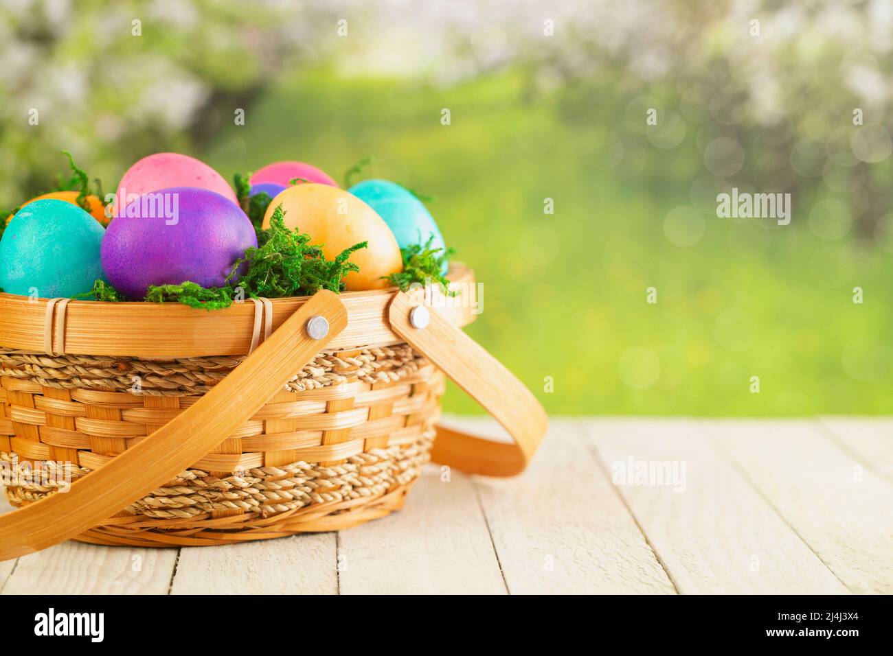 Basket Full of Colorful Solid Boiled Easter Eggs Stock Photo