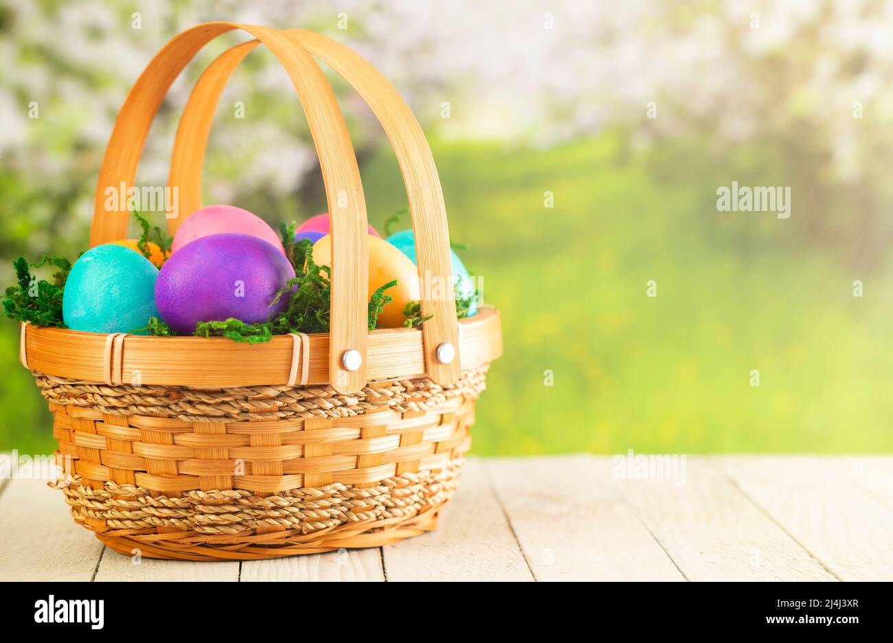 Basket Full of Colorful Solid Boiled Easter Eggs Stock Photo