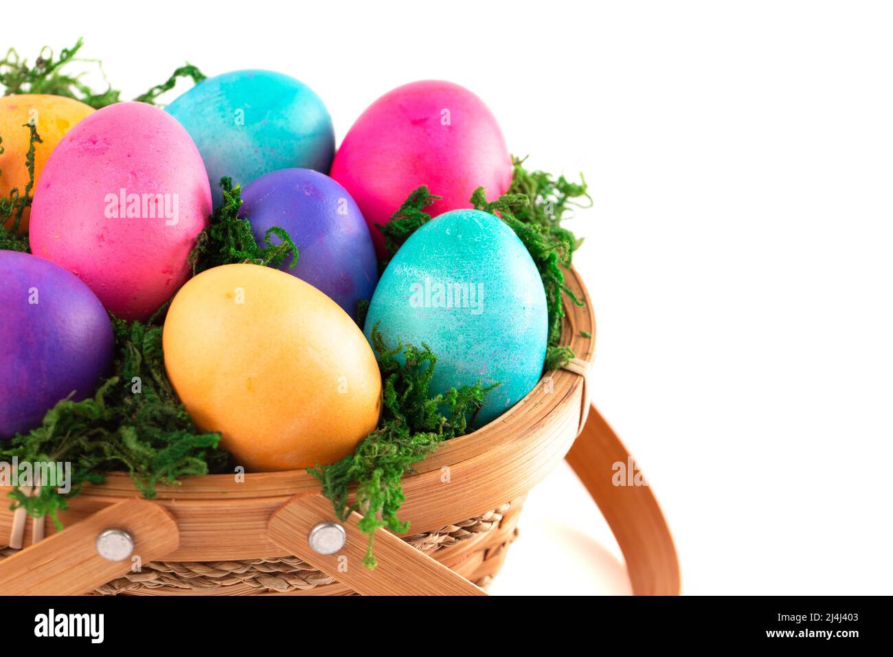 Basket Full of Colorful Solid Boiled Easter Eggs Stock Photo