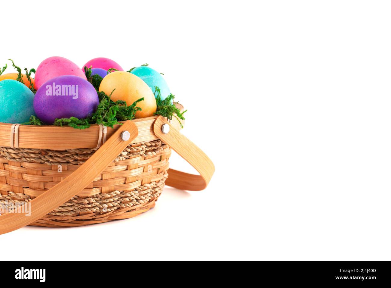 Basket Full of Colorful Solid Boiled Easter Eggs Stock Photo