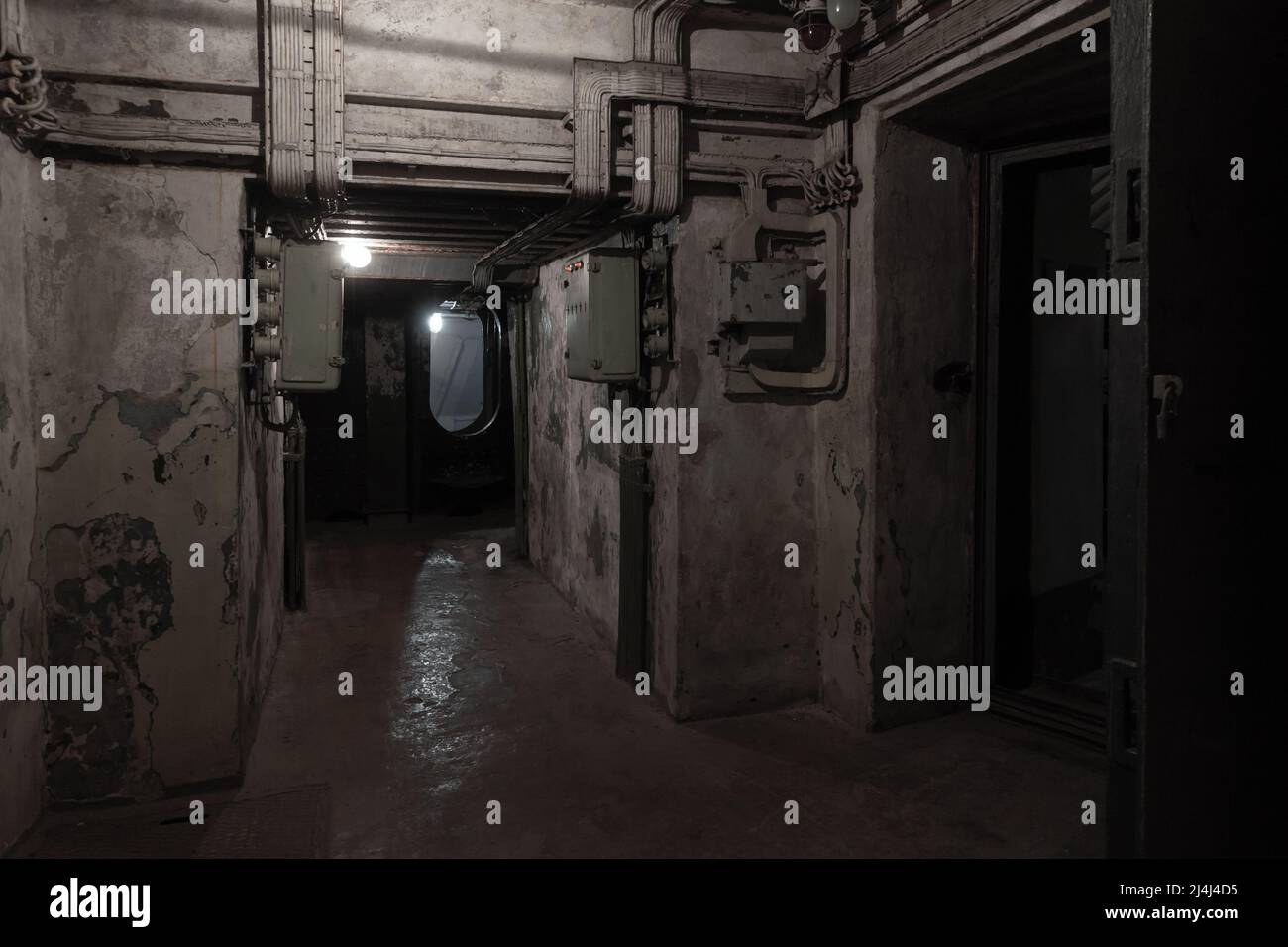 Abstract dark military bunker interior, grungy underground rooms Stock Photo