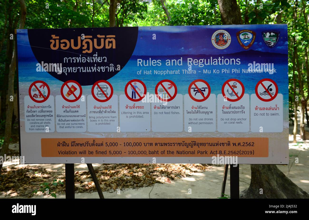KRABI, THAILAND - March 23, 2022 : Sign Rules and Regulations of Hat Noppharat Thara Mu Ko Phi Phi  National Park Stock Photo