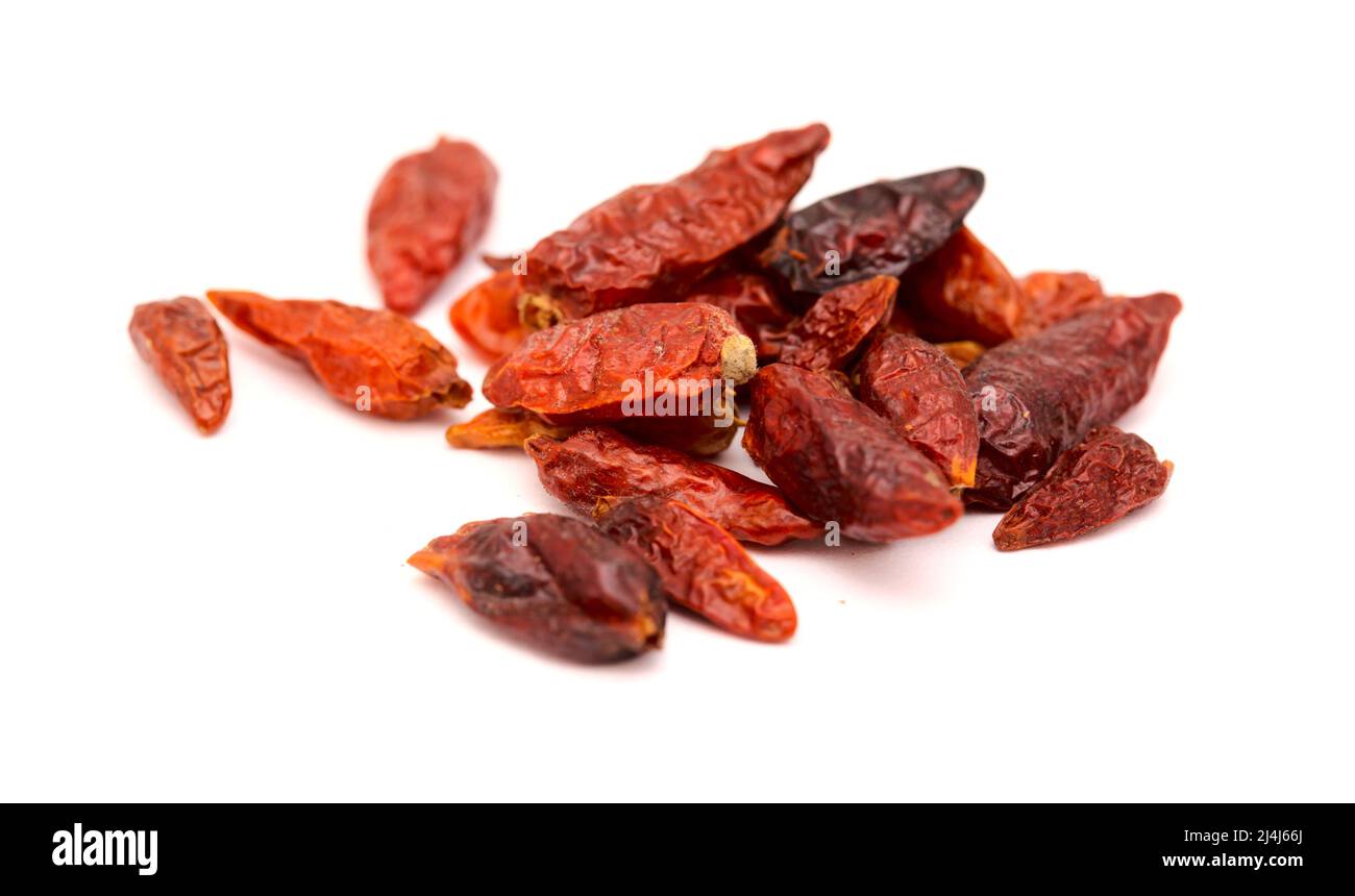 dry small bird eye chili peppers isolated on white background Stock Photo
