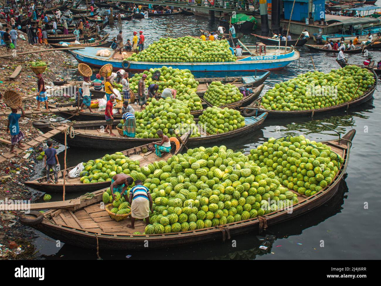 Floating wholesale fruit market on the Buriganga river Stock Photo