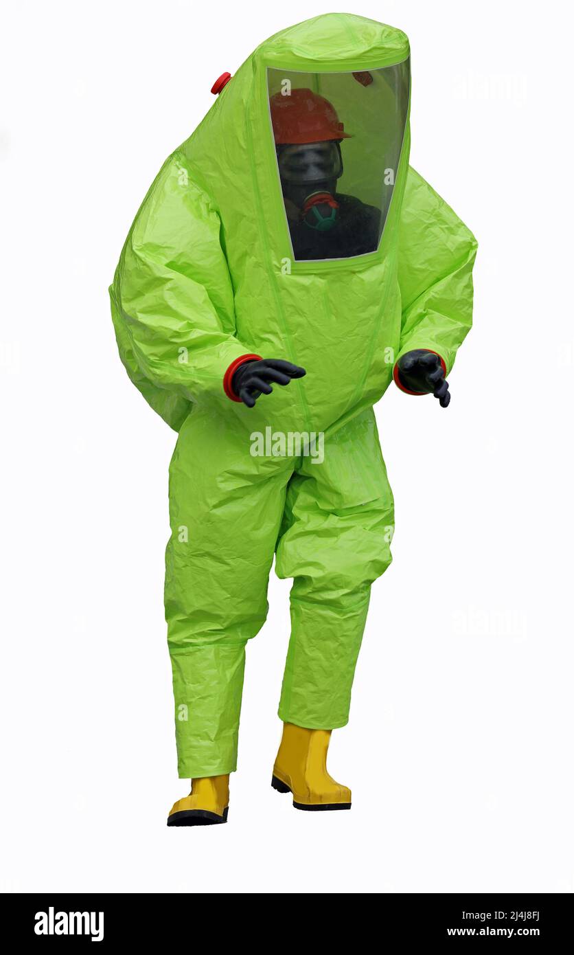 person inside the protective suit against contamination and chemical risk who breathes with the mask and a self-contained breathing apparatus to filte Stock Photo