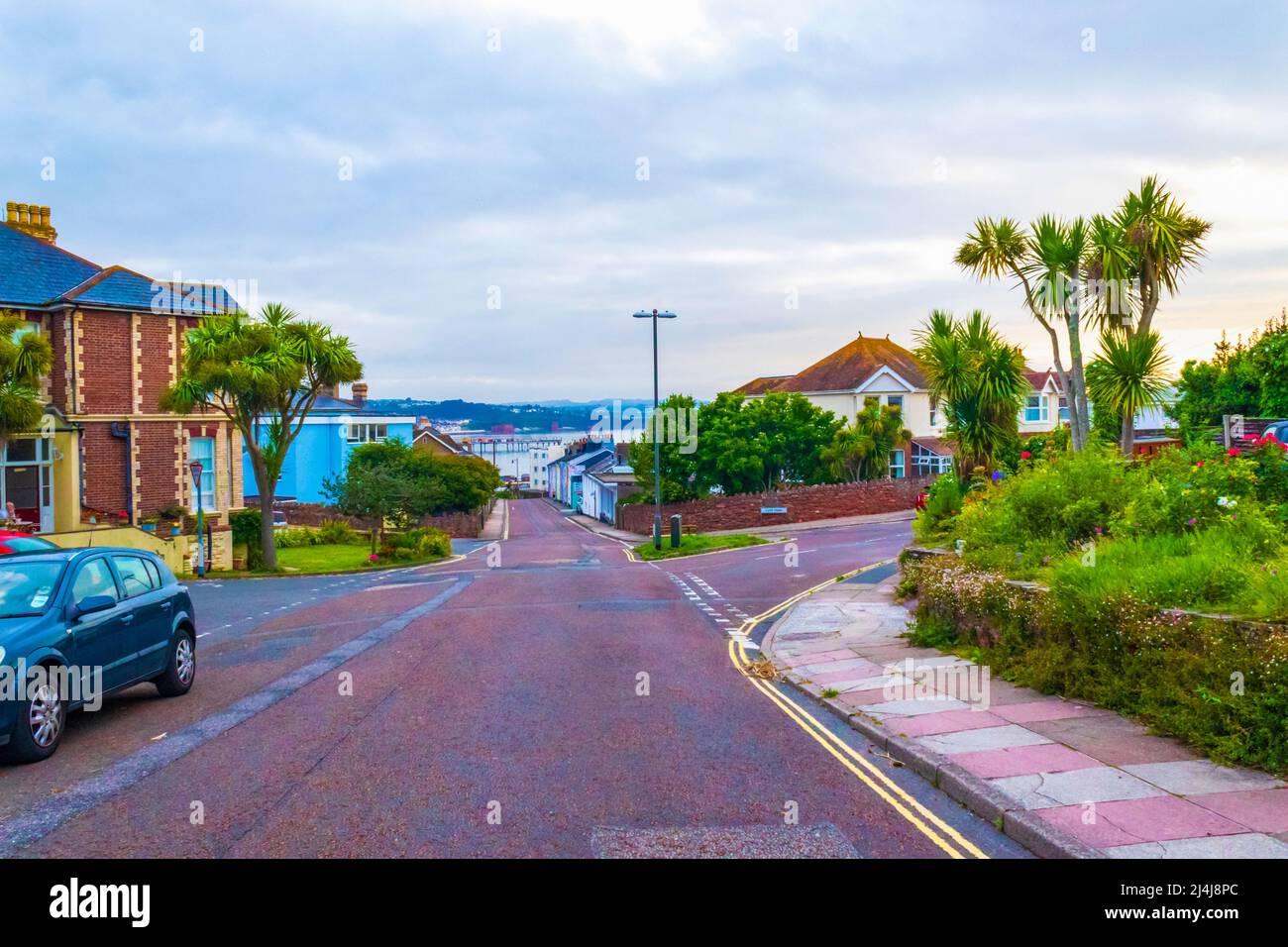 View of an empty street of Paignton leading to the sea on nice summer