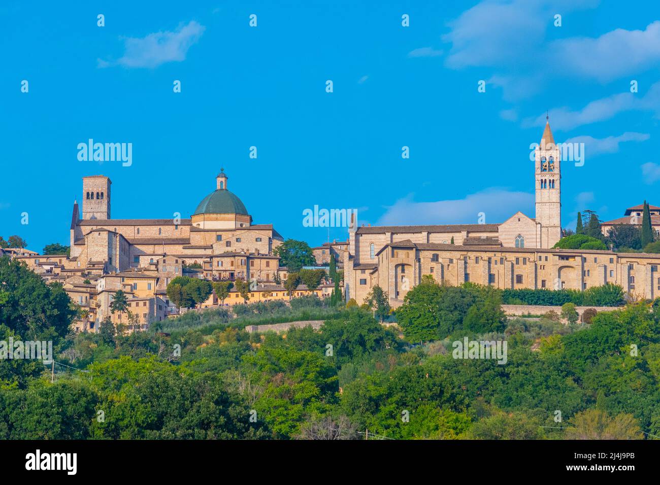 Basilica di Santa Chiara and cathedral of San rufino in Italian town Assisi. Stock Photo