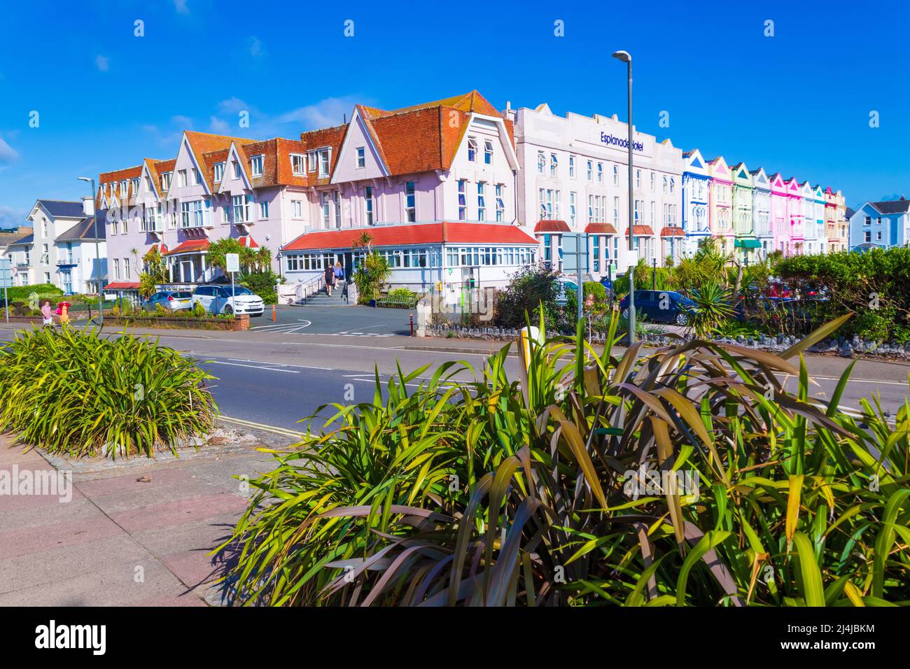 Colorful beachside traditional buildings along the coastal street by