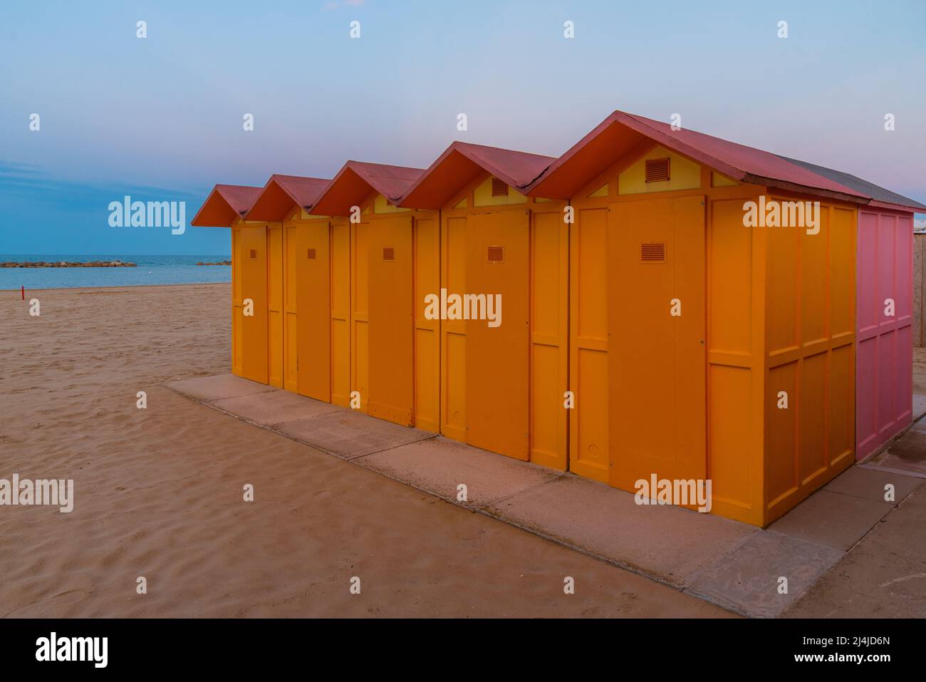 Colourful changing rooms on a beach in Pesaro, Italy Stock Photo - Alamy