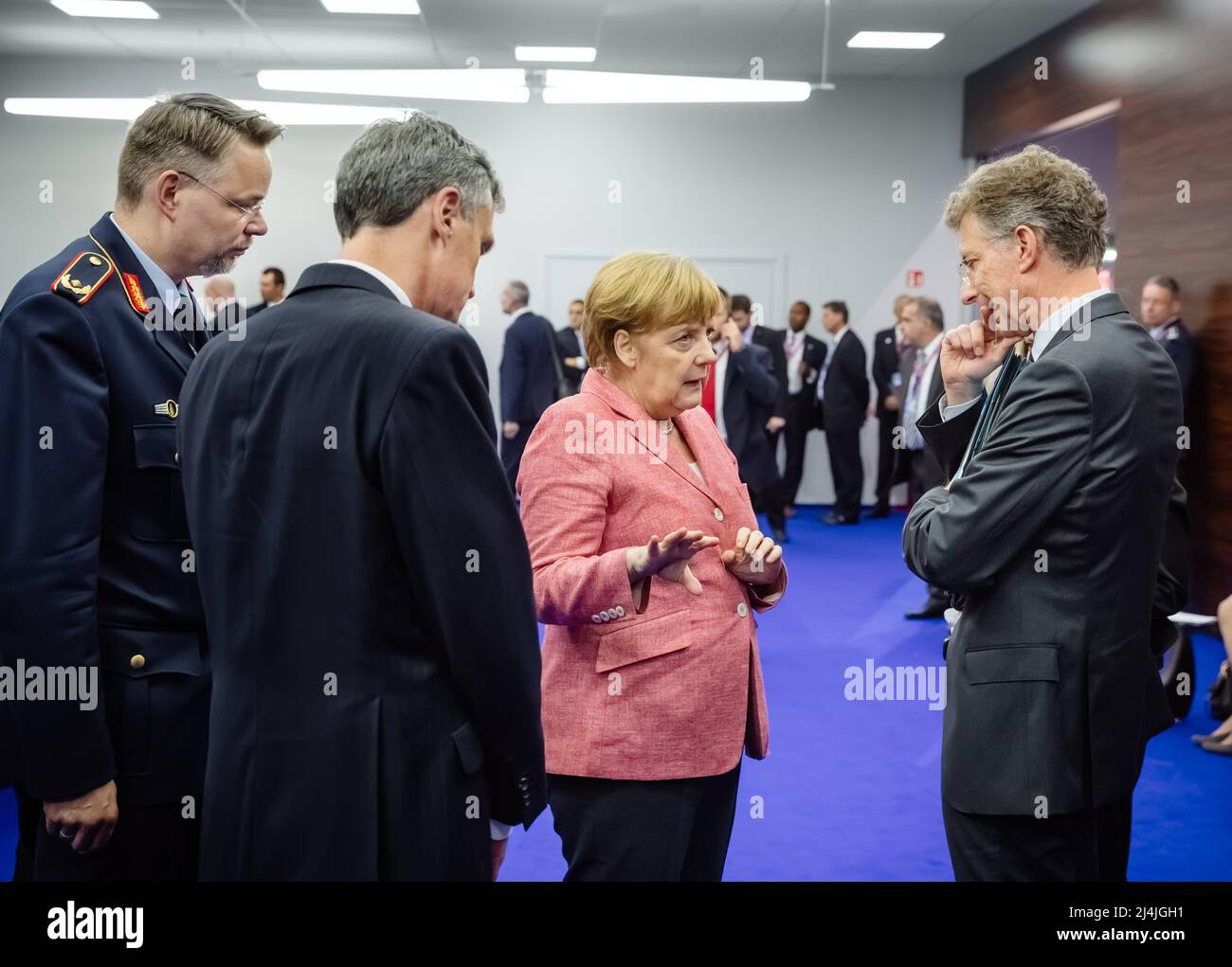 German Chancellor Angela Merkel (C) at the North Atlantic Treaty Organization summit in Poland. German Chancellor Angela Merkel (archival image) Stock Photo