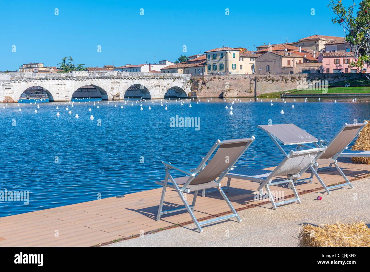 Sundeck overlooking Bridge of Tiberius (Ponte di Tiberio) in Rimini ...