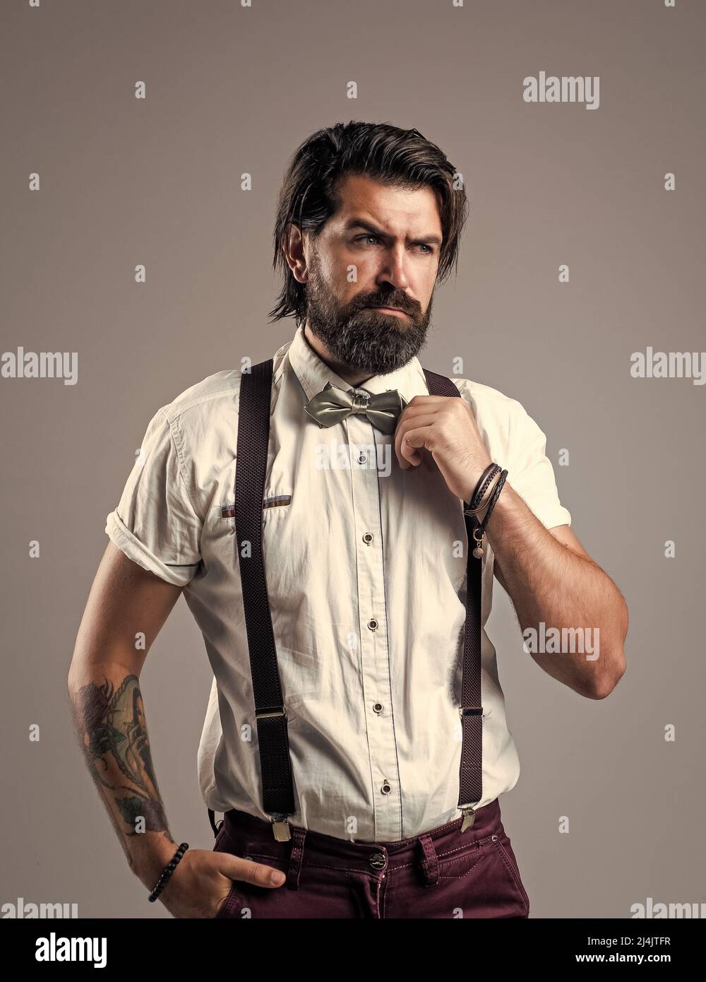Handsome macho. formal party dress code. old fashioned bearded hipster