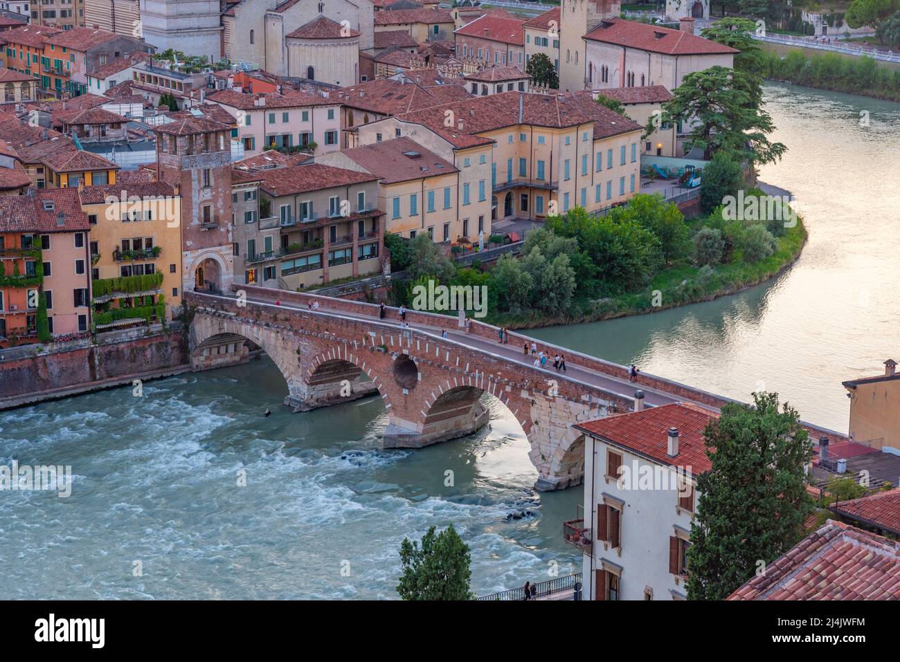 Sunset view of Ponte Pietra bridge in Verona, Italy Stock Photo - Alamy