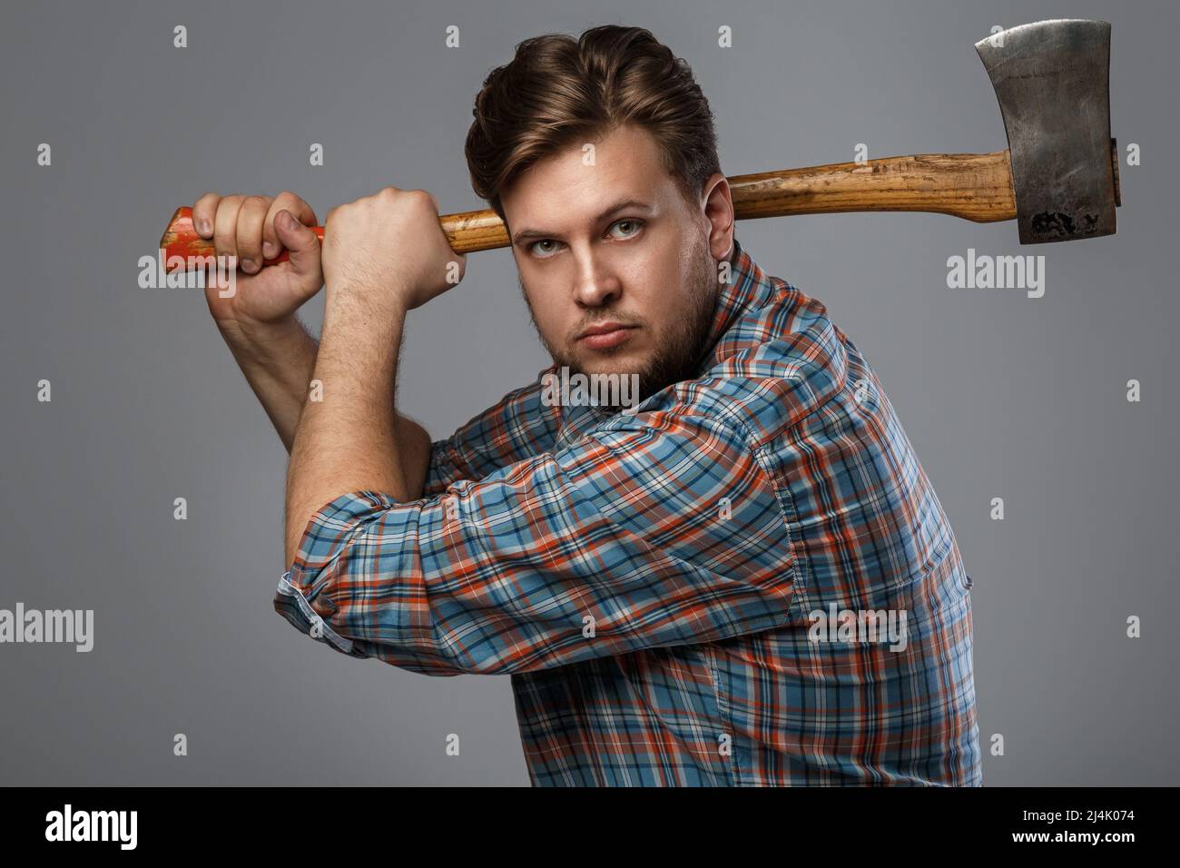 Masculinity handsome man axe hi-res stock photography and images - Alamy