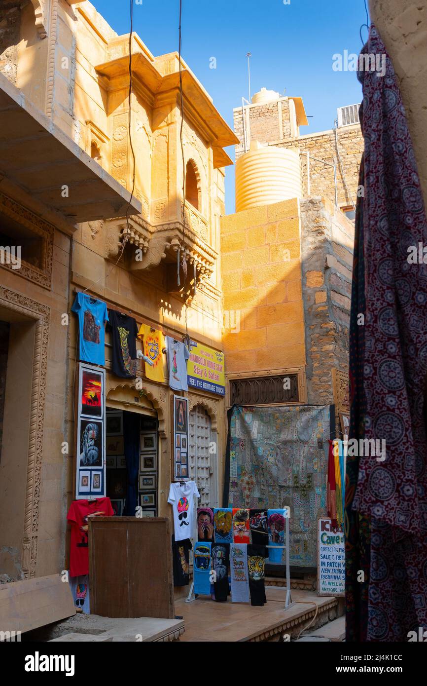 Jaisalmer, Rajasthan, India - October 13, 2019 : Pashmina shawls are being sold in market place Inside Jaisalmer Fort or Golden Fort, in the morning l Stock Photo