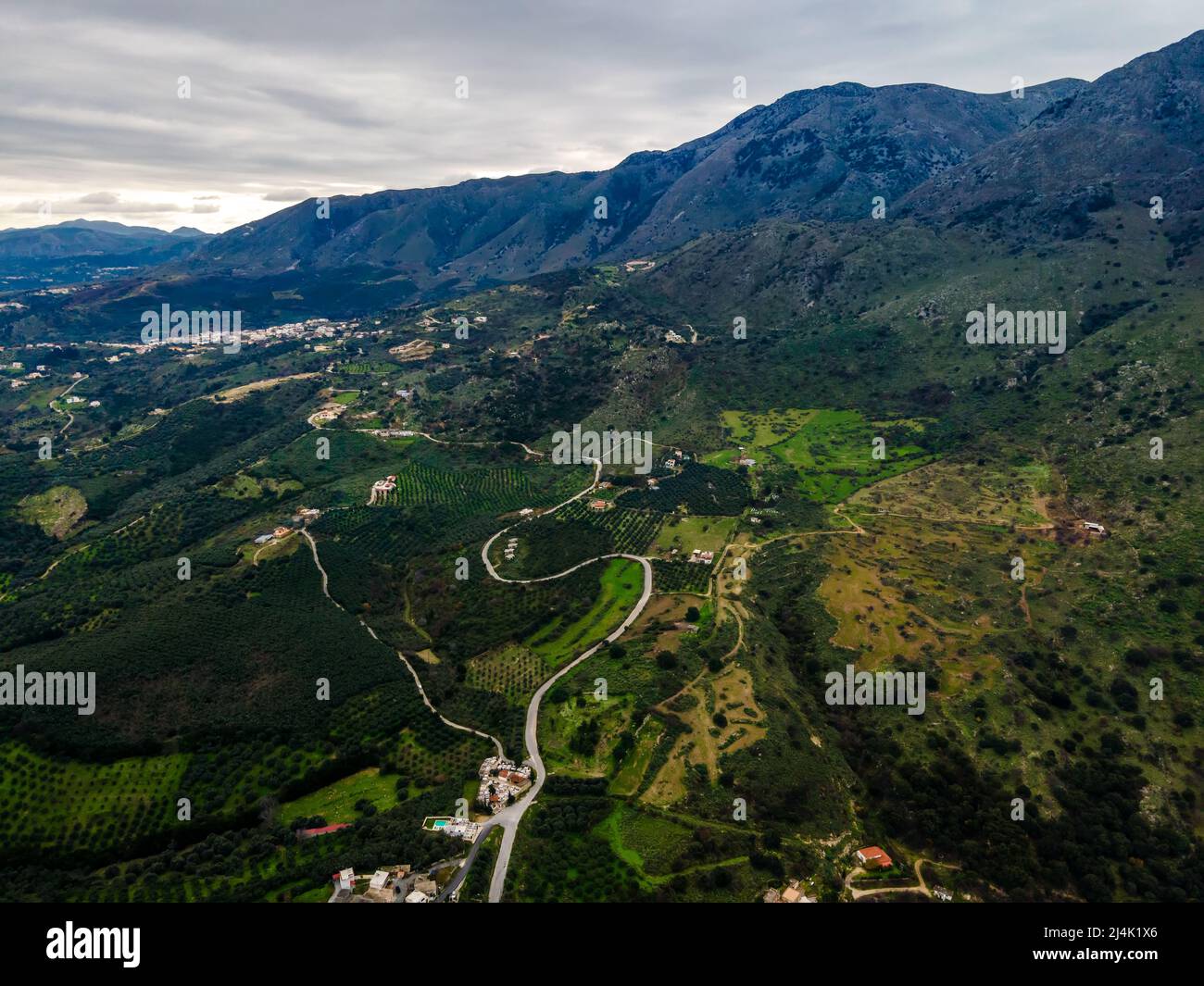 Aerial top view with a drone of the Cretan landscape with mountains. Stock Photo