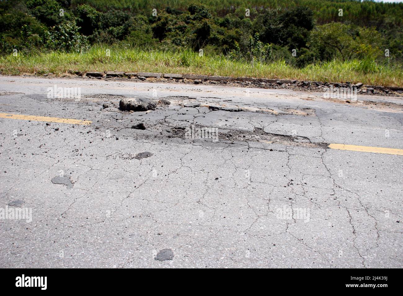 highway roof with defective and spoiled asphalt, dangerous for traffic Stock Photo