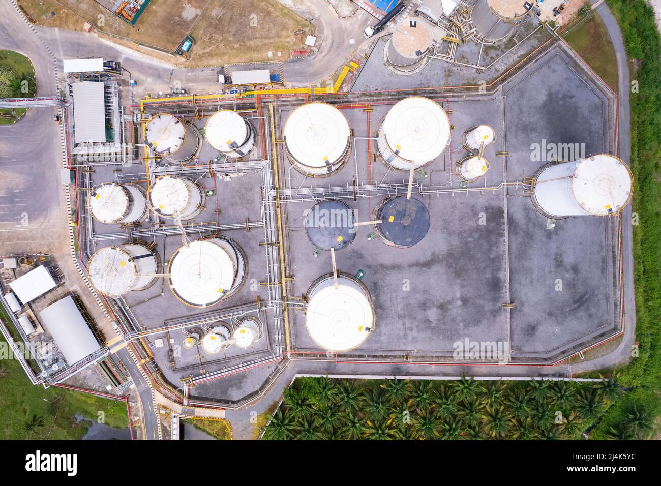 Aerial view white fuel storage tank in oil refinery plant. Top view