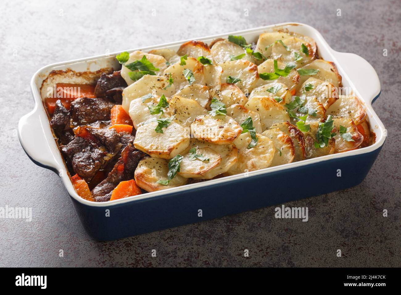 English Lancashire hot pot with meat and potato closeup in the baking