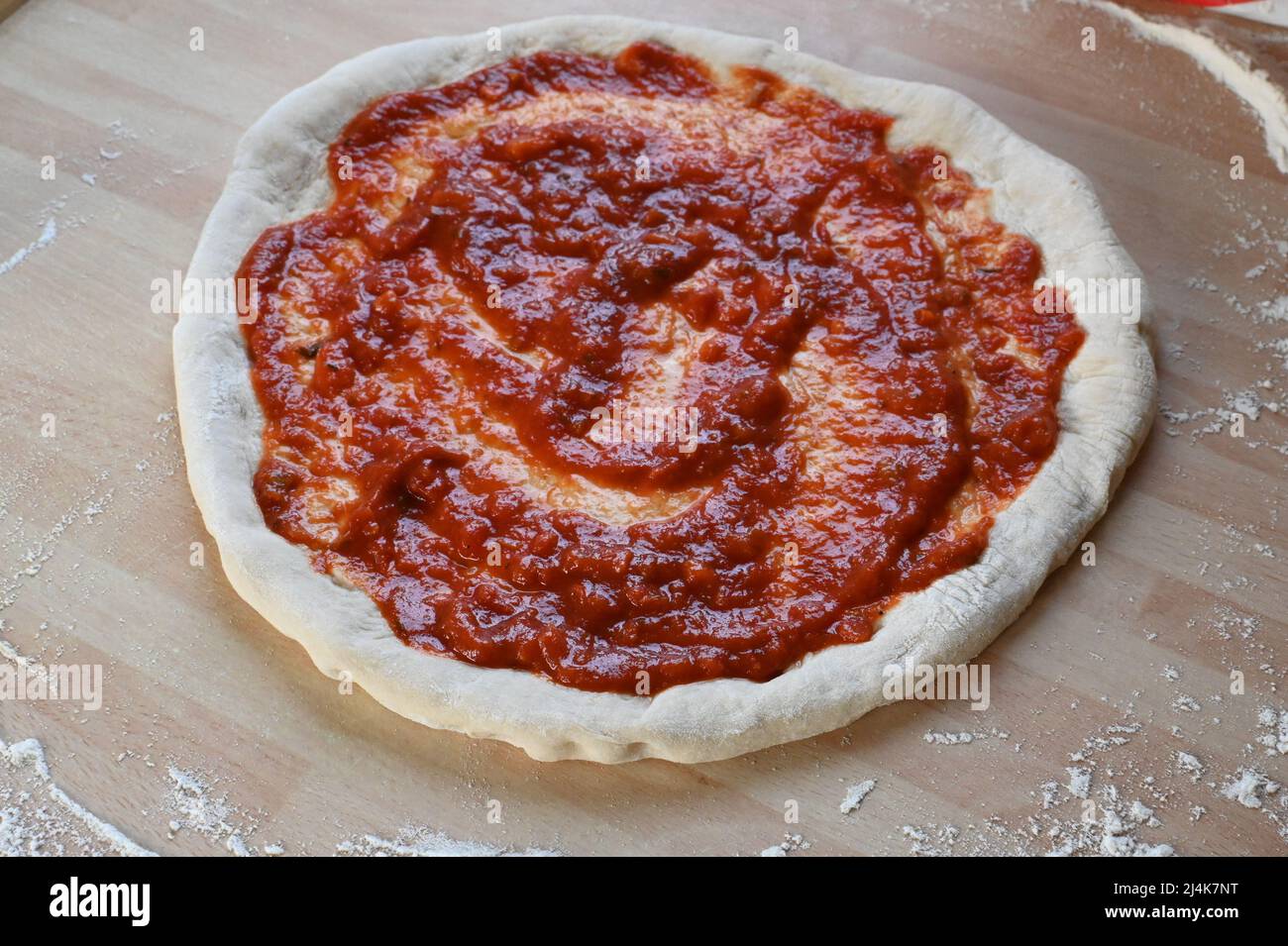 Pizza Recipe, building a new York style pepperoni Pizza Stock Photo Alamy
