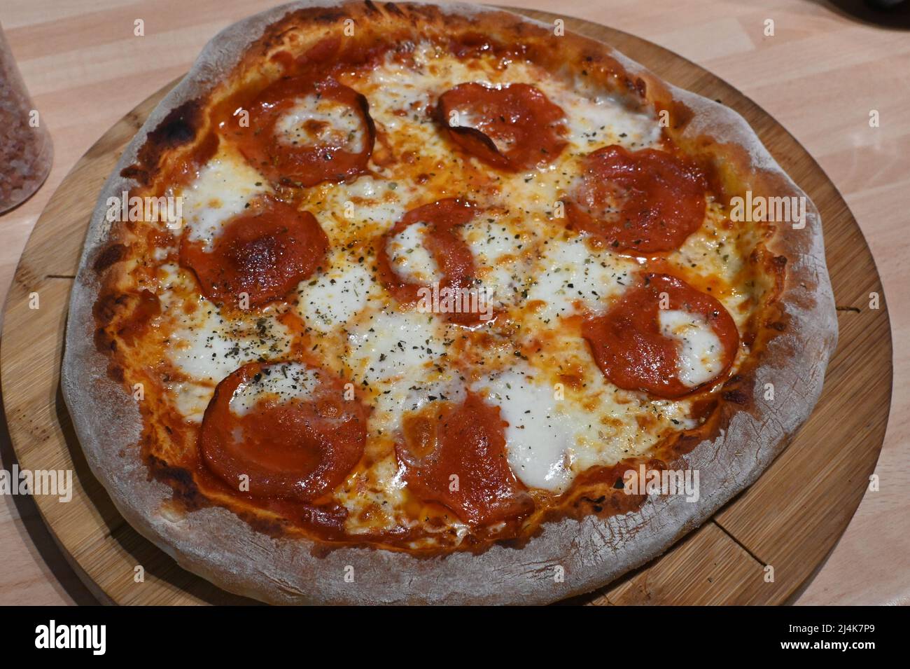 Pizza Recipe, fresh cooked new York style pepperoni Pizza Stock Photo