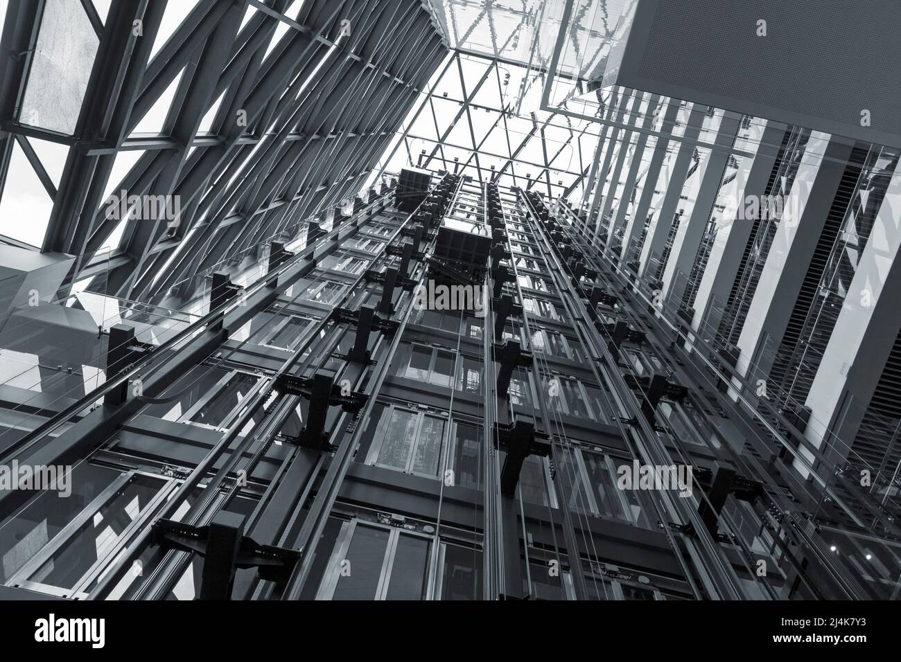 Modern steel background and abstract metal structure, black and white low angle high contrast picture Stock Photo