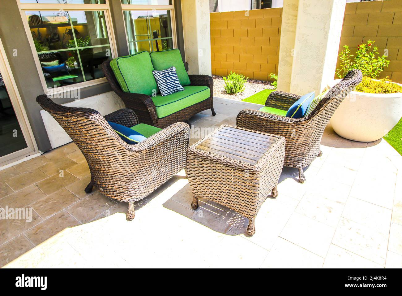 Wicker arm chairs hi-res stock photography and images - Alamy