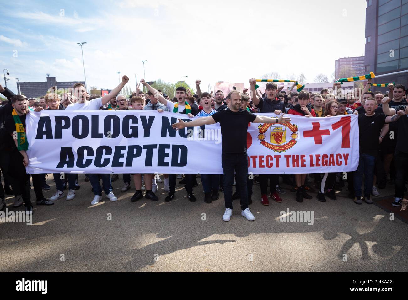 Manchester, UK. 16th Apr, 2022. Manchester United supporters protest against the Glazers. Fans hold a banner outside Old Trafford to boycott the first 17 minutes of the game which signifies a minute for each year the Glazers have owned the club. Credit: Andy Barton/Alamy Live News Stock Photo