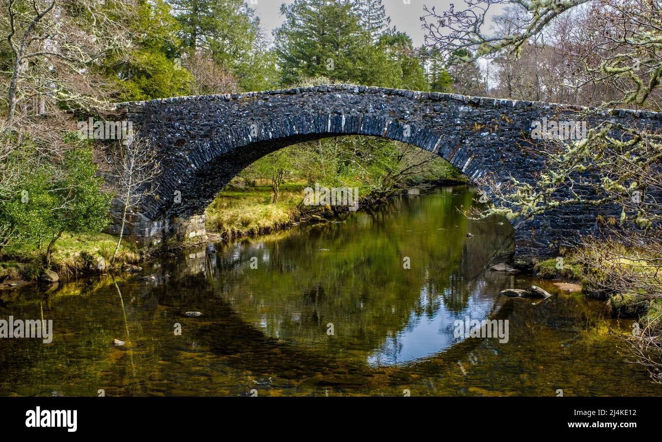 Old stone bridge over the River Moidart, west highlands of Scotland Stock Photo