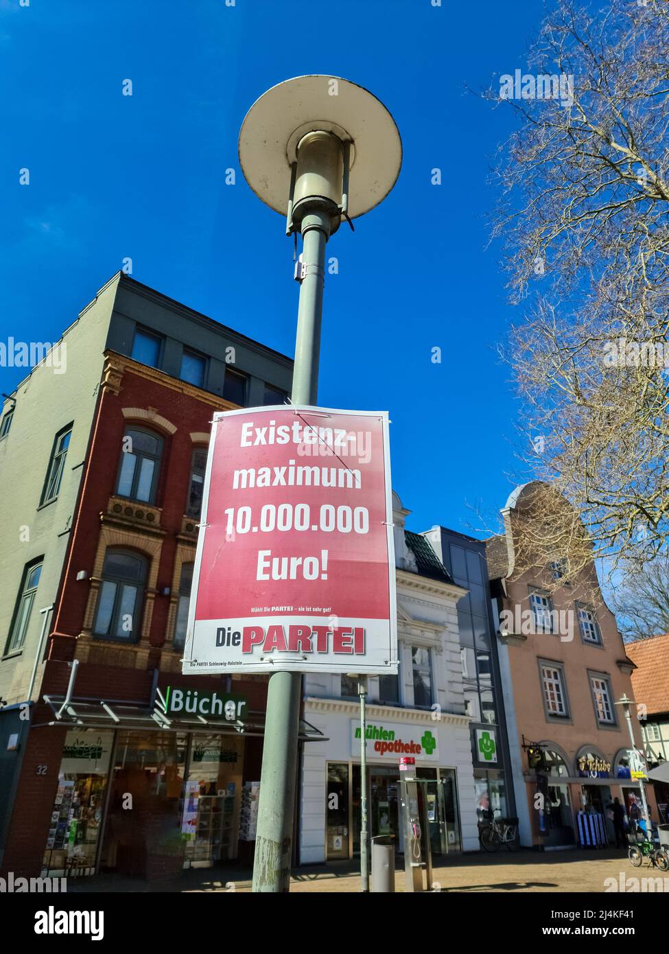 Neumuenster, Germany - 16. April 2022: An election poster of the German party named Die Partei on a lamppost before the state election Stock Photo
