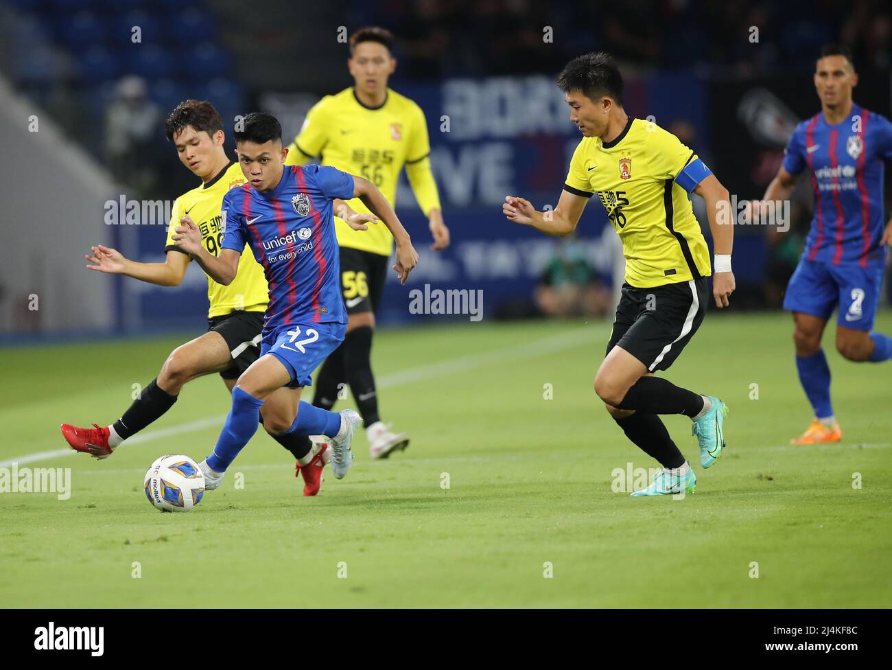 Johor Baru, Malaysia. 15th Apr, 2022. Arif Aiman of Johor Darul Ta'zim (L) and Yang Xin of Guangzhou Evergrande are seen in action during the AFC Champions League Group I match between Guangzhou Evergrande and Johor Darul Ta'zim at the Sultan Ibrahim Stadium.(Final score; Guangzhou Evergrande 0:5 Johor Darul Ta'zim) (Photo by Wong Fok Loy/SOPA Images/Sipa USA) Credit: Sipa USA/Alamy Live News Stock Photo