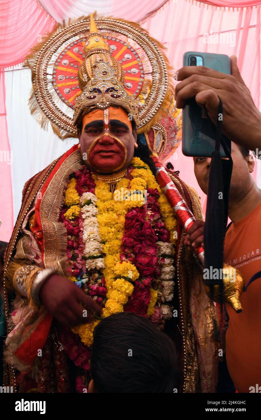 Men dress in costumes of Lord Hanuman ji dancing and blessing to ...