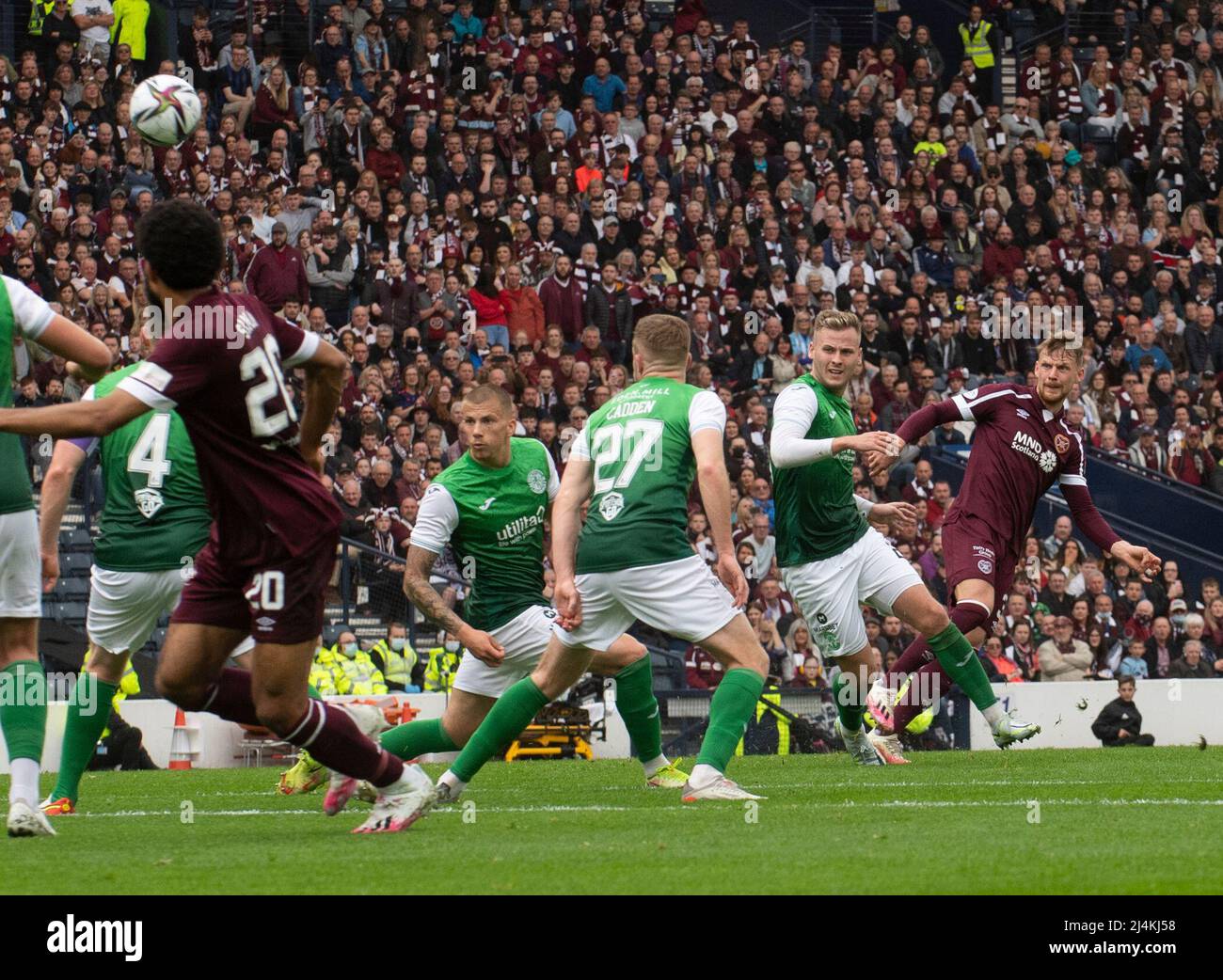 Edinburgh, UK. 16th Apr, 2022. Scottish Cup Semi-Final - Heart of Midlothian FC v Hibernian FC 16/04/2022 Pic shows: Hearts' left-back, Stephen Kingsley, fires home what proved to be the winning goal as Hearts take on Hibs in the Scottish Cup semi final at Hampden Park, Glasgow Credit: Ian Jacobs/Alamy Live News Stock Photo
