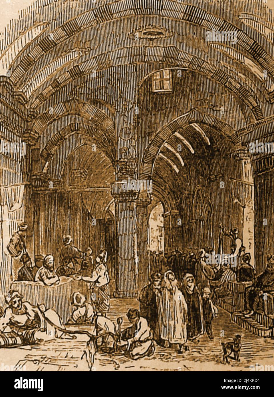 A 19th century engraving showing the Great Bazaar Constantinople (Istanbul) as it was at the time. Today the Grand Bazaar is still operating and employs around 26,000 people and attracts up to 400,000 visitors daily -----------------------Konstantinopolis'teki Büyük Çarşı'yı gösteren 19. yüzyıldan kalma bir gravür (İstanbul). Stock Photo