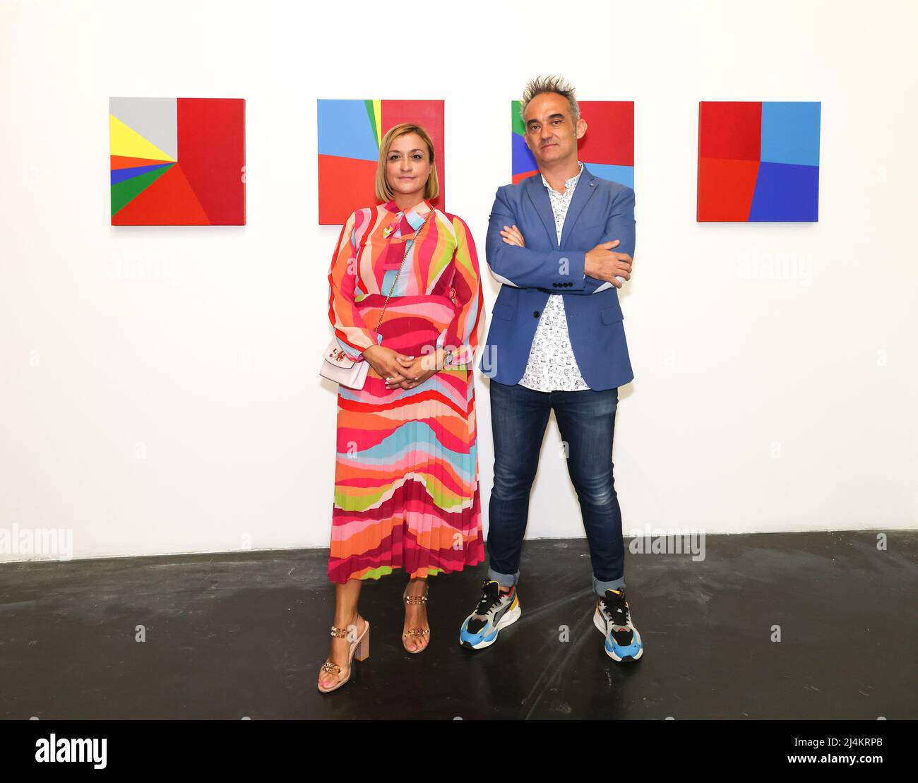 Santa Monica, California, USA. 14th April, 2022. Artists Cynthia Viera and Pablo San José of the Spanish art collective PSJM attending the opening of PSJM's 'American Democracy' art exhibition at Building Bridges Art Exchange at Bergamot Art Center in Santa Monica, California. The art exhibition featured 59 paintings, each representing the election year of a United States president and the historical results of each political party (red = Republican, blue = Democratic, etc.) displayed in a geometric format. Credit: Sheri Determan Stock Photo