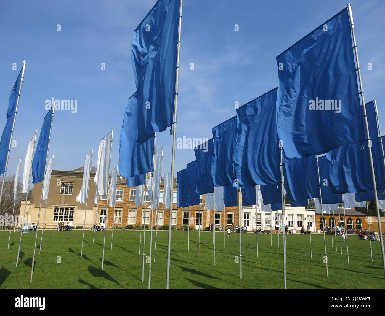 Sea of blue & white flags on the lawn at Delapre Abbey: 'In Memoriam', an artwork by Luke Jerram to remember NHS workers and those lost to COVID-19. Stock Photo