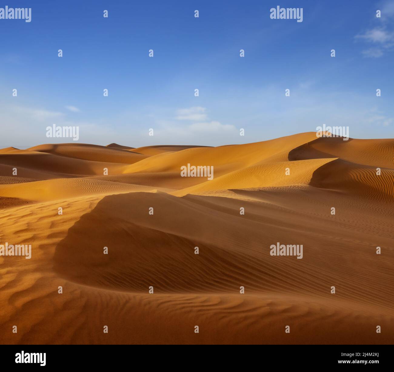 Sand blowing over sand dunes in wind Stock Photo