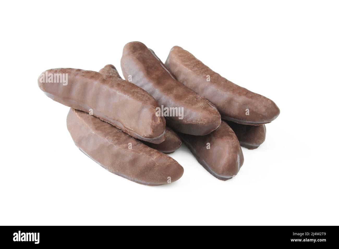 Pile of foamy chocolate coated banana flavor snack isolated on white background Stock Photo