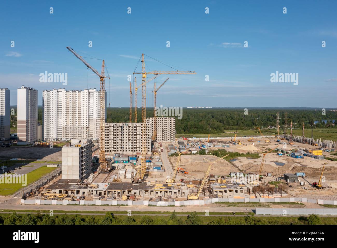 Building crane and buildings under construction Stock Photo