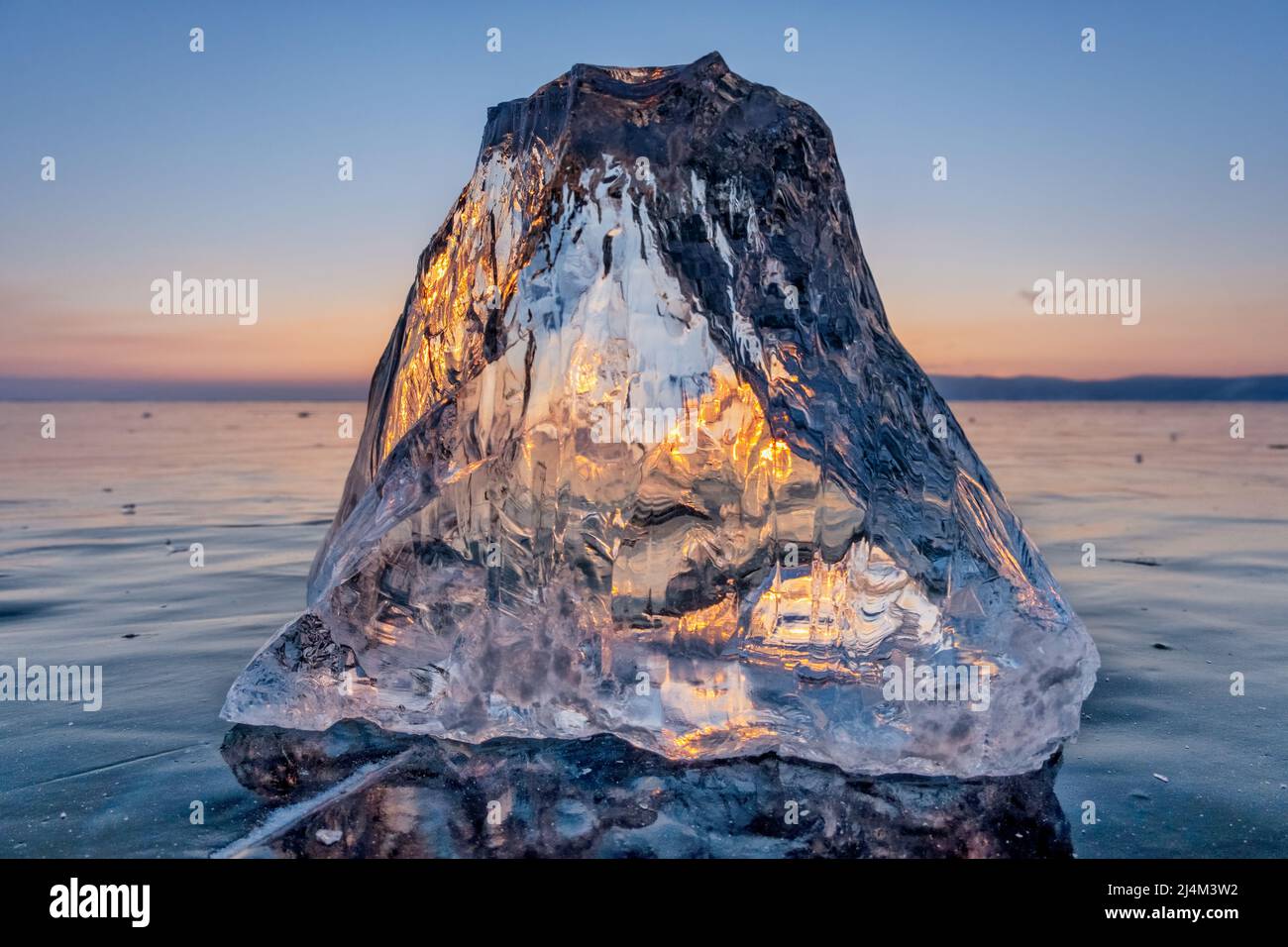 Sunlight refracted in piece of ice Stock Photo