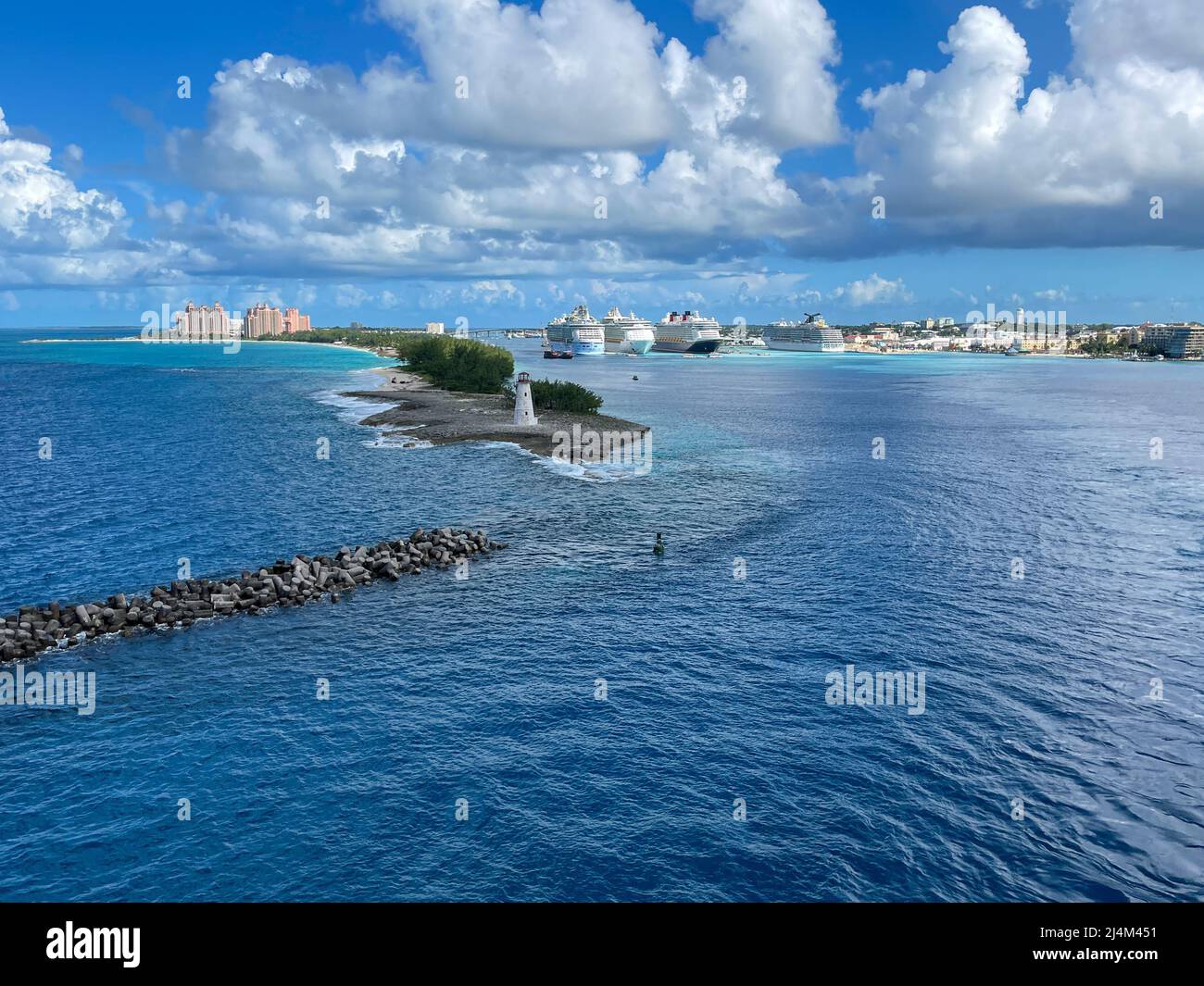 Nassau, Bahamas - October 13, 2021: An aerial view of the cruise ship harbor in Nassau, Bahamas from a cruise ship that is sailing away. Stock Photo